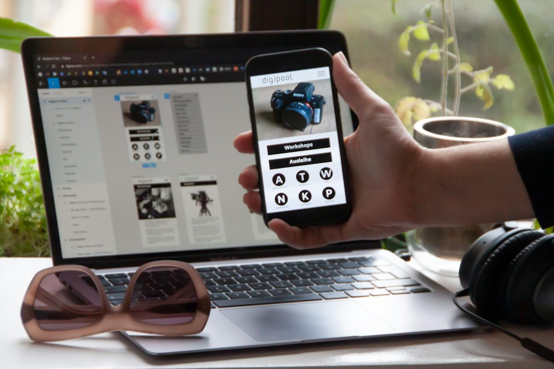 person holding black and white ceramic mug figma design board mobile prototype ui components