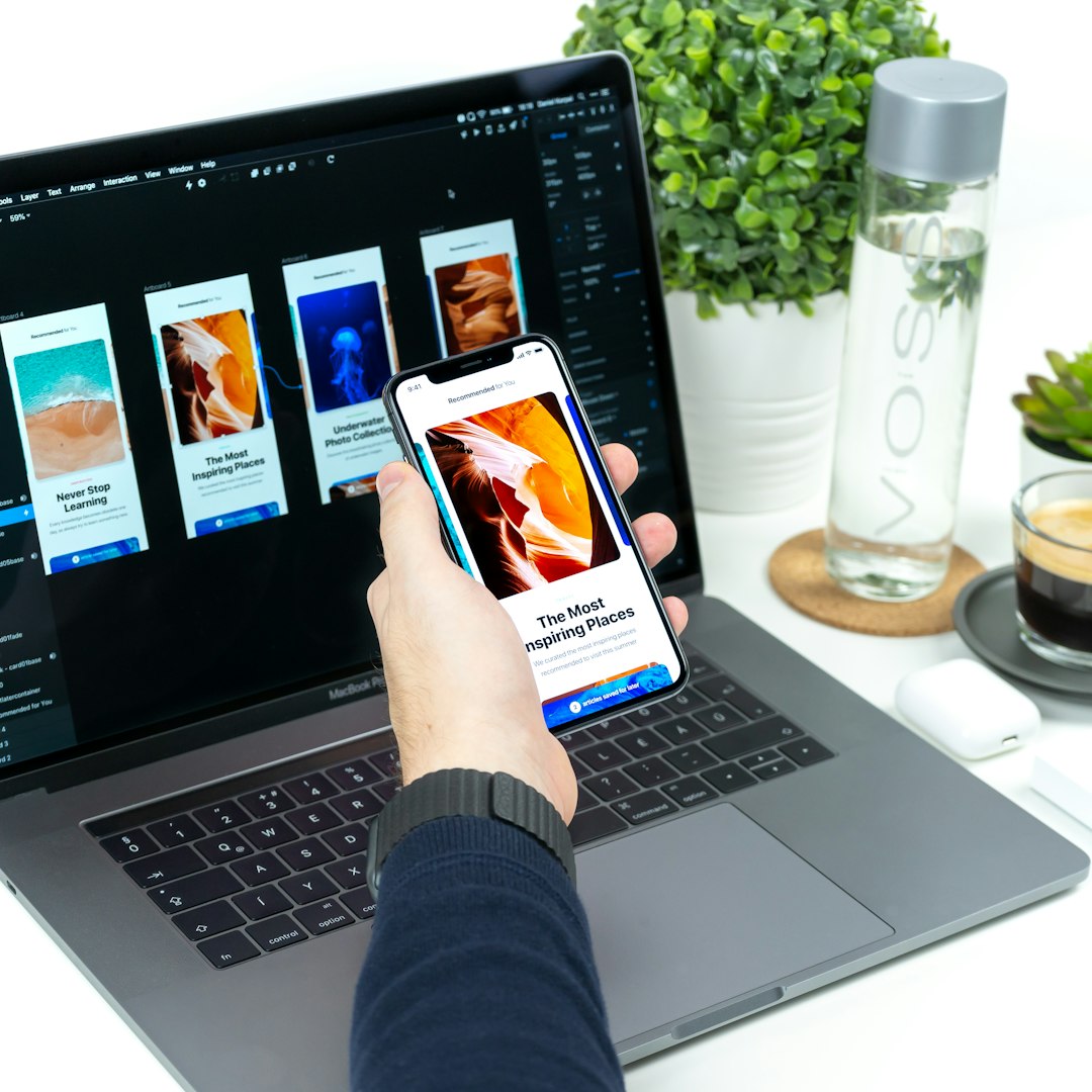 person holding iphone turned on user comparison platform choice digital services