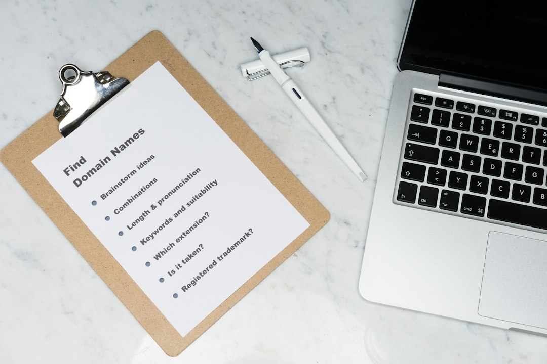 white printer paper beside silver macbook editing checklist short paragraphs job search