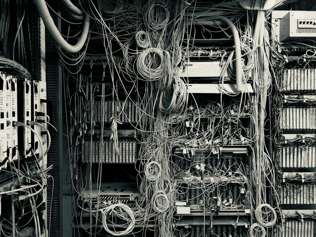 a bunch of wires and wires in a room putty windows server connections messy desktop