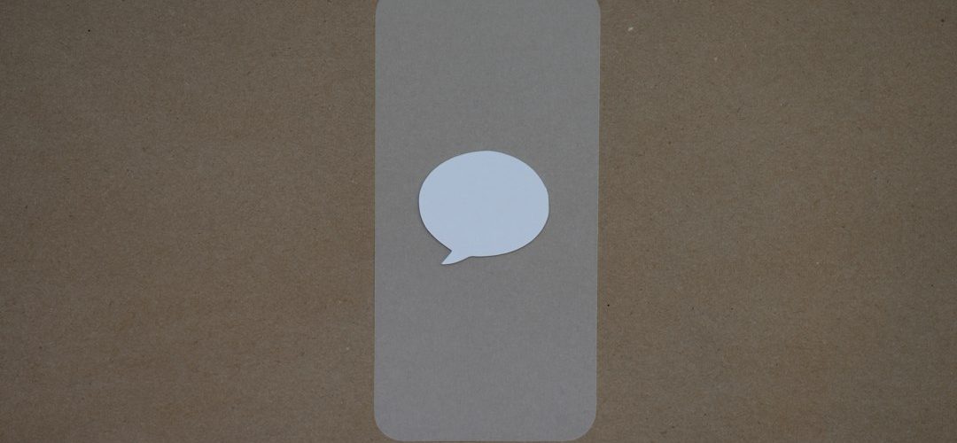 a white speech bubble sticker on a brown background react chat interface message bubbles streaming text