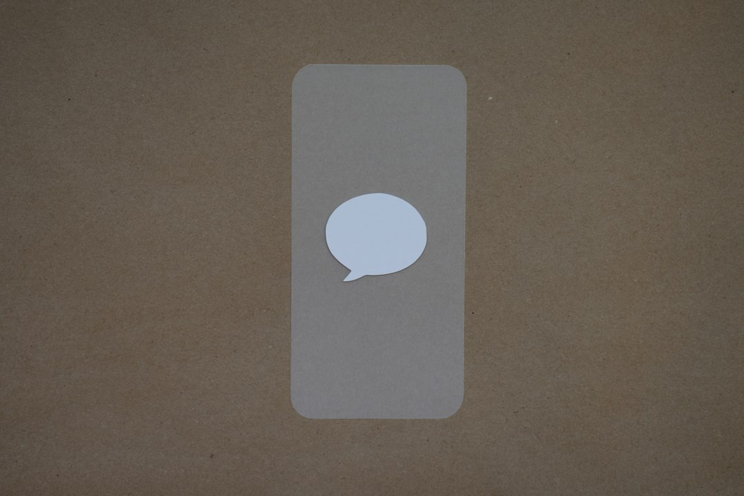 a white speech bubble sticker on a brown background react chat interface message bubbles streaming