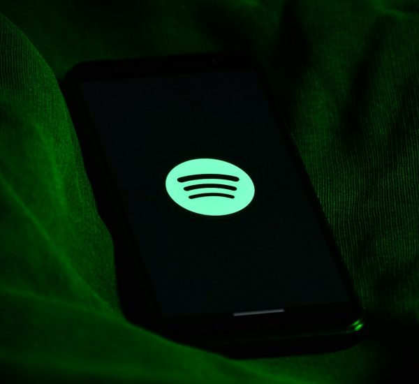 black and white power bank spotify app phone offline playlist green download icon