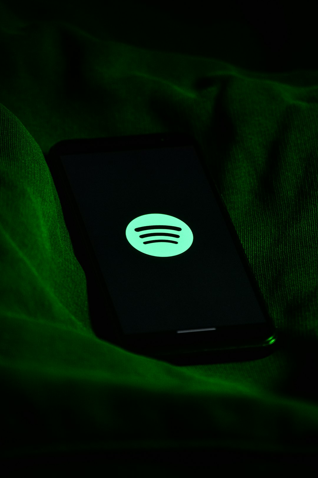 black and white power bank spotify app phone offline playlist green download icon