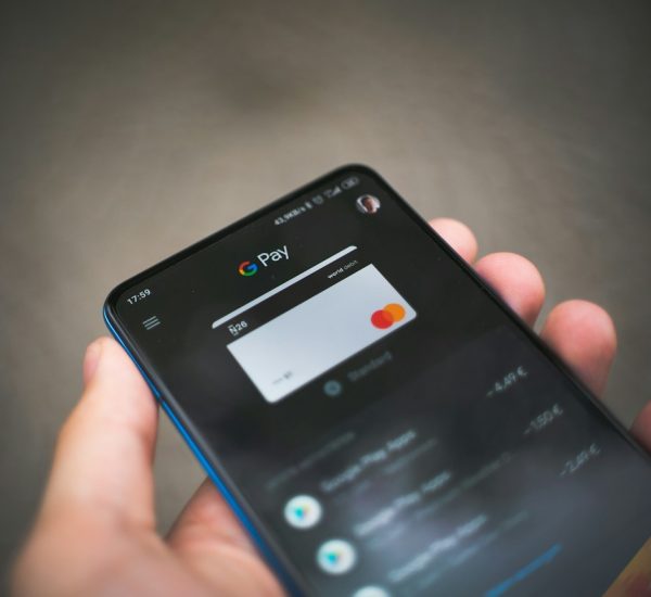 black samsung android smartphone displaying icons mobile banking app checking account quick transfer
