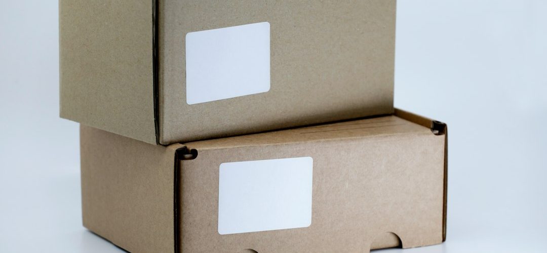 brown cardboard box on white table shipping dashboard parcels ecommerce orders