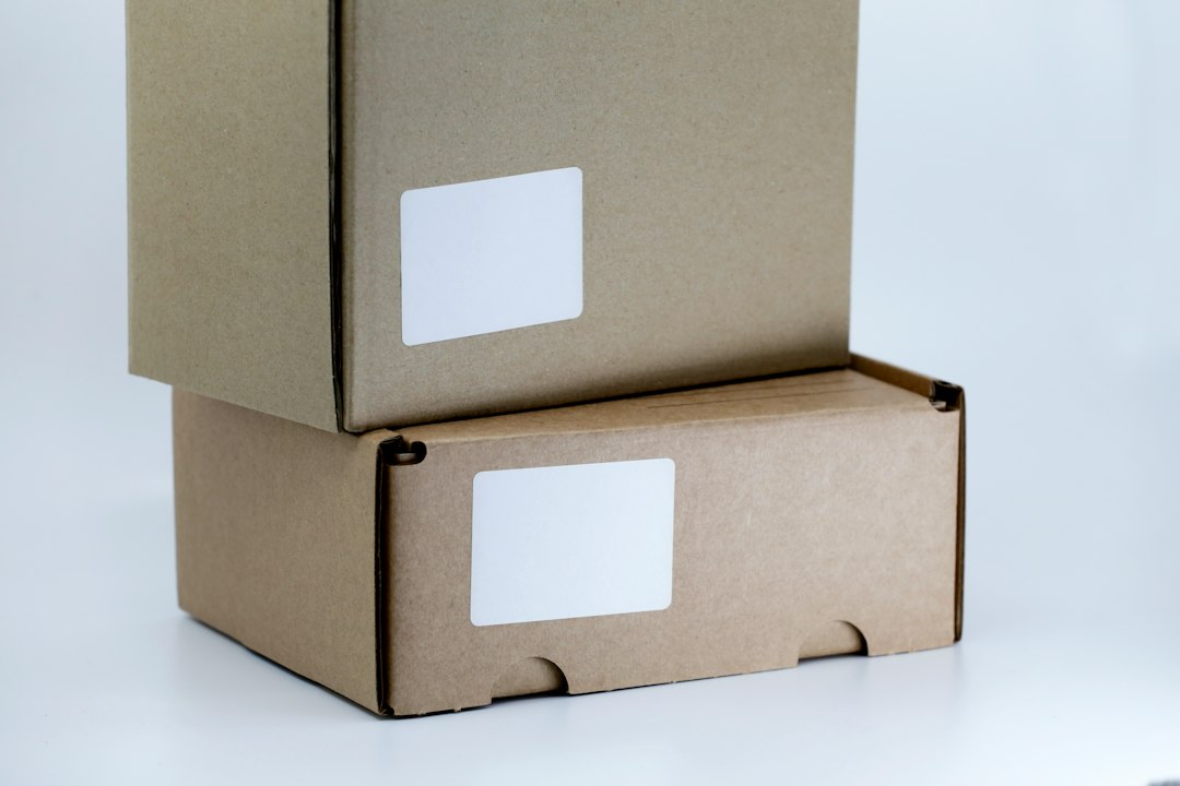 brown cardboard box on white table shipping dashboard parcels ecommerce orders