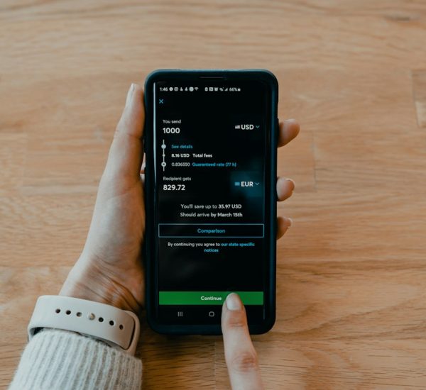 Metro by T-Mobile vs Mint Mobile: Which Phone Service Offers Better Value and Online Account Management? 8 person holding black samsung android smartphone mobile plans price comparison prepaid phone service