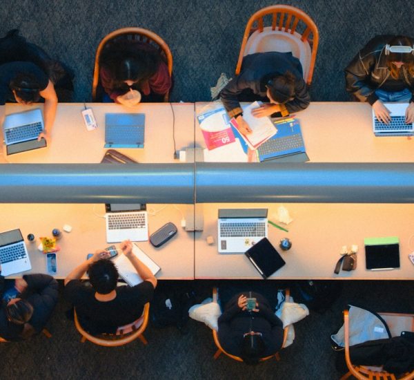 Cybersecurity Tabletop Exercise: Incident Response Tabletop vs Disaster Recovery Exercise 7 students studying together at a long table security team meeting ransomware alert incident timeline