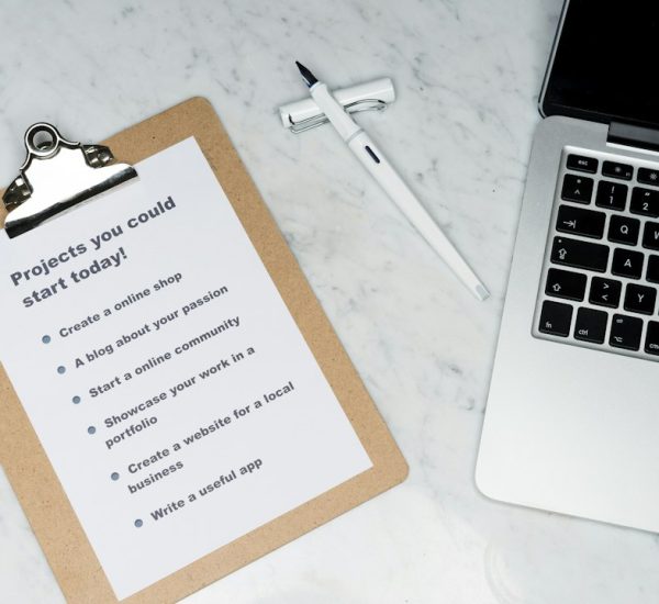 KlickAud: Best Audio Download Alternatives Compared 2 white printer paper beside silver laptop computer email checklist professional farewell workplace etiquette