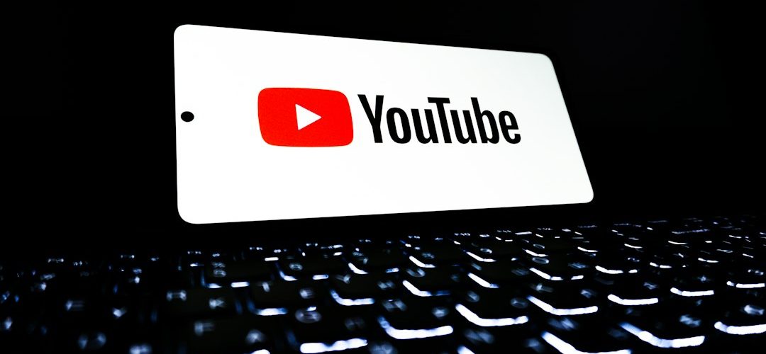 youtube logo displayed on a keyboard youtube analytics fake subscribers low engagement