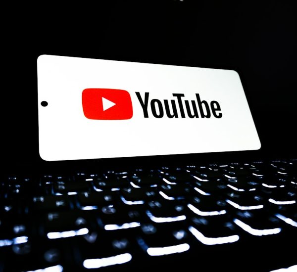 youtube logo displayed on a keyboard youtube analytics fake subscribers low engagement